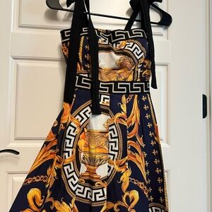 Elegant Black and Gold Women's Dress